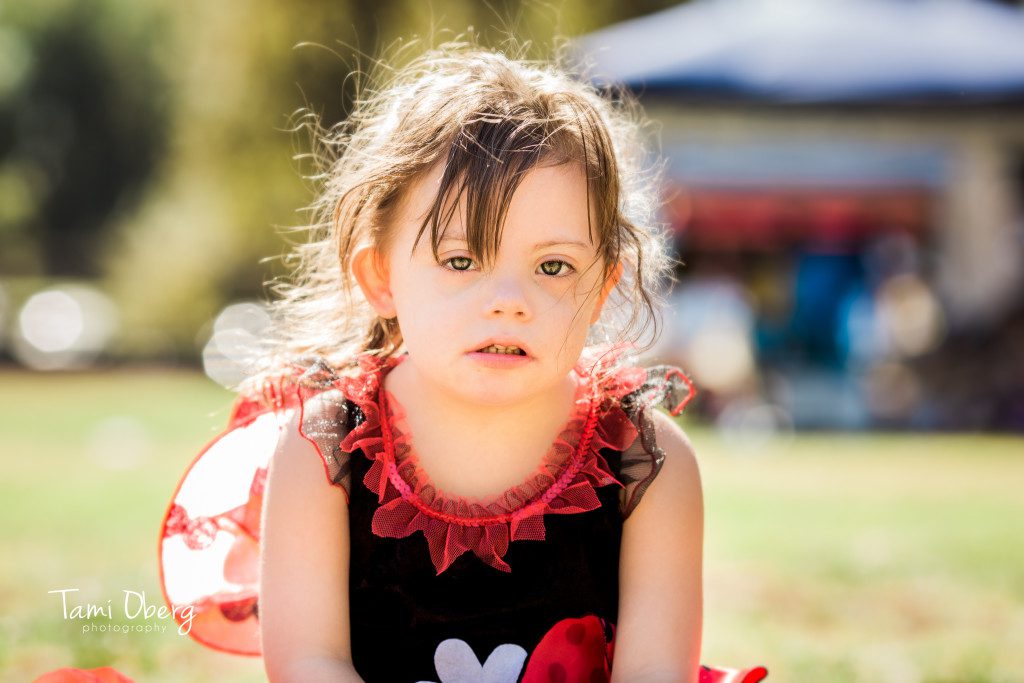 little girl looking at the camera