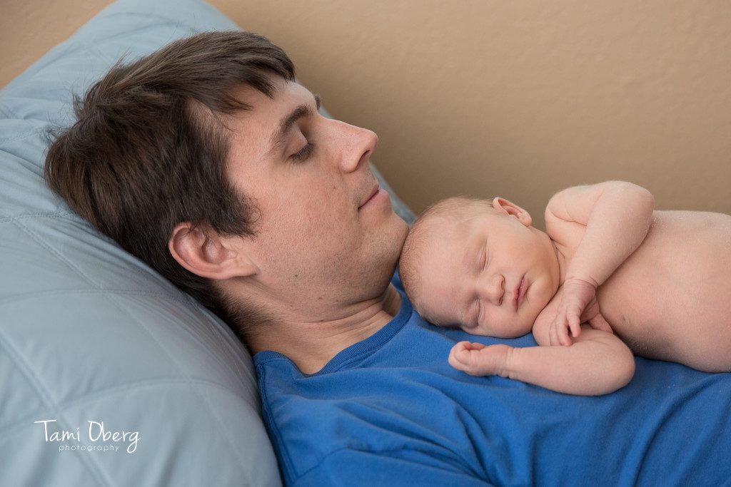 baby sleeping on his dad's chest