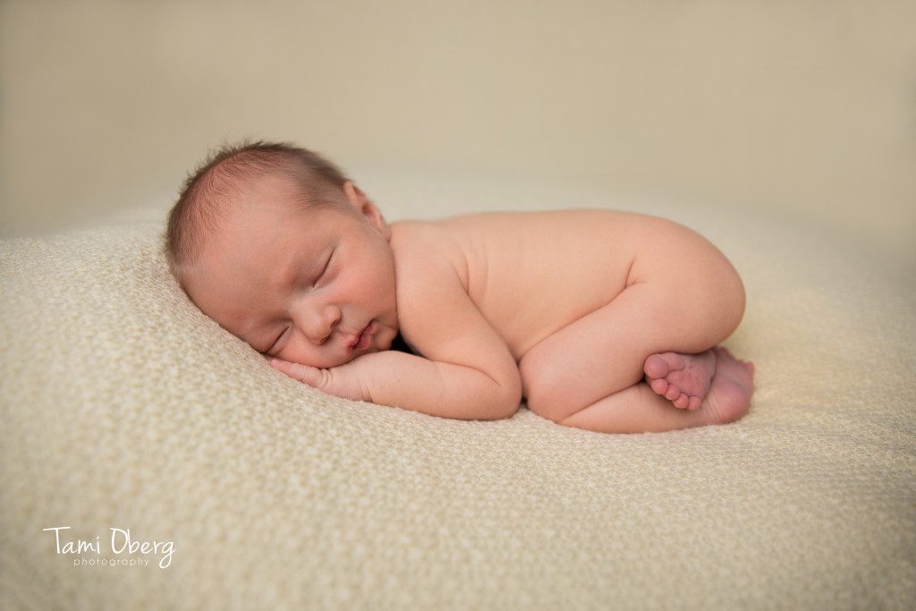 little boy in tushie pose