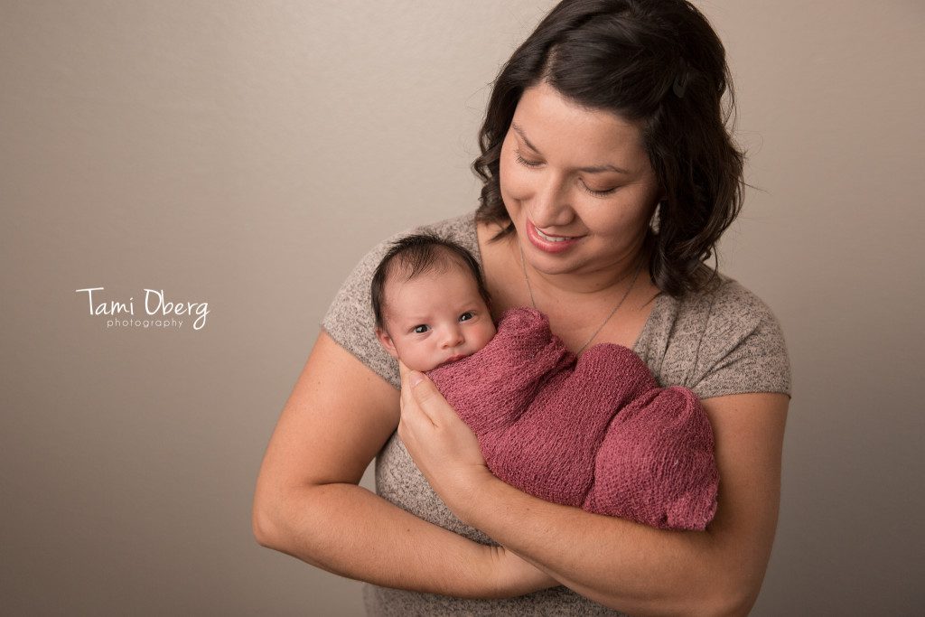 newborn baby with wide eyes