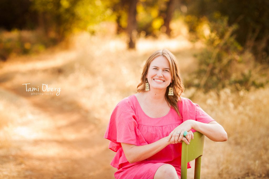 picture of a woman on a green chair