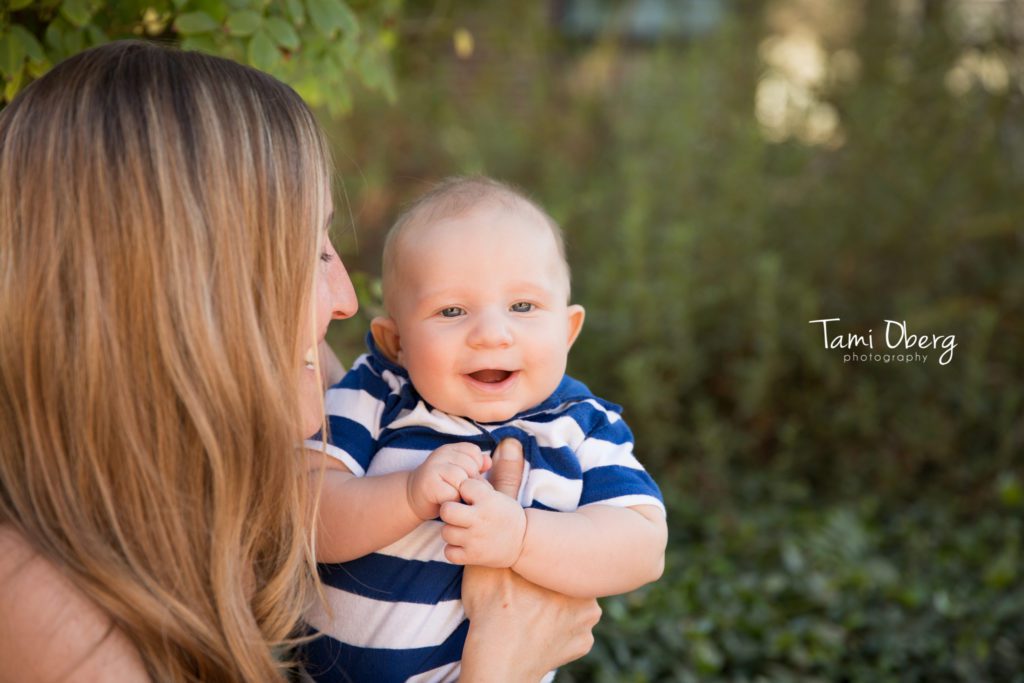 mom holding baby boy