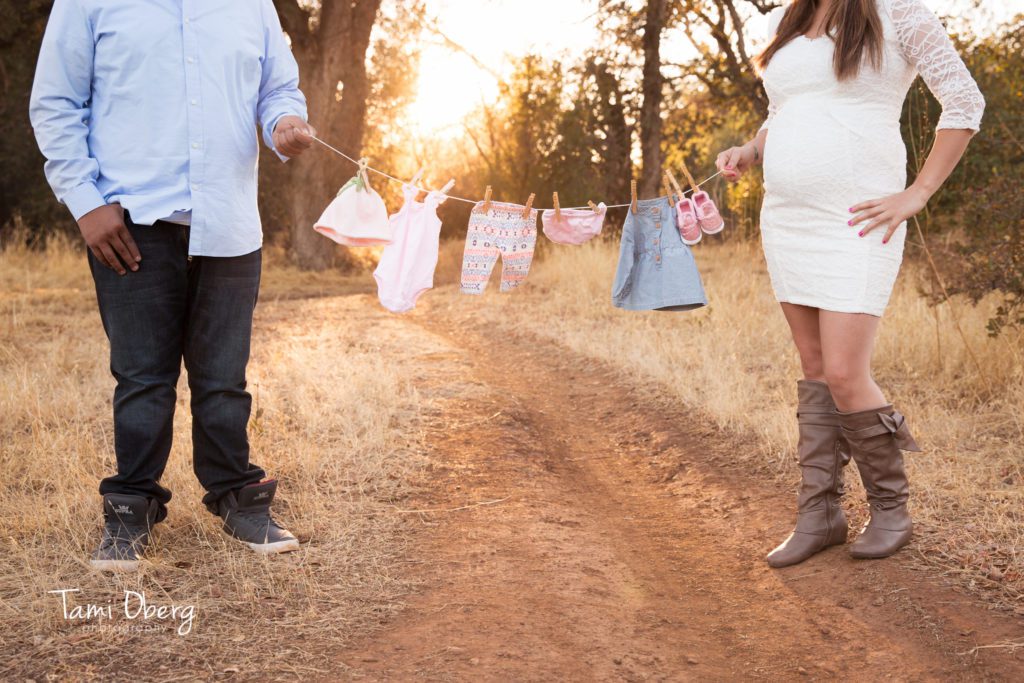 clothesline with baby girl clothes