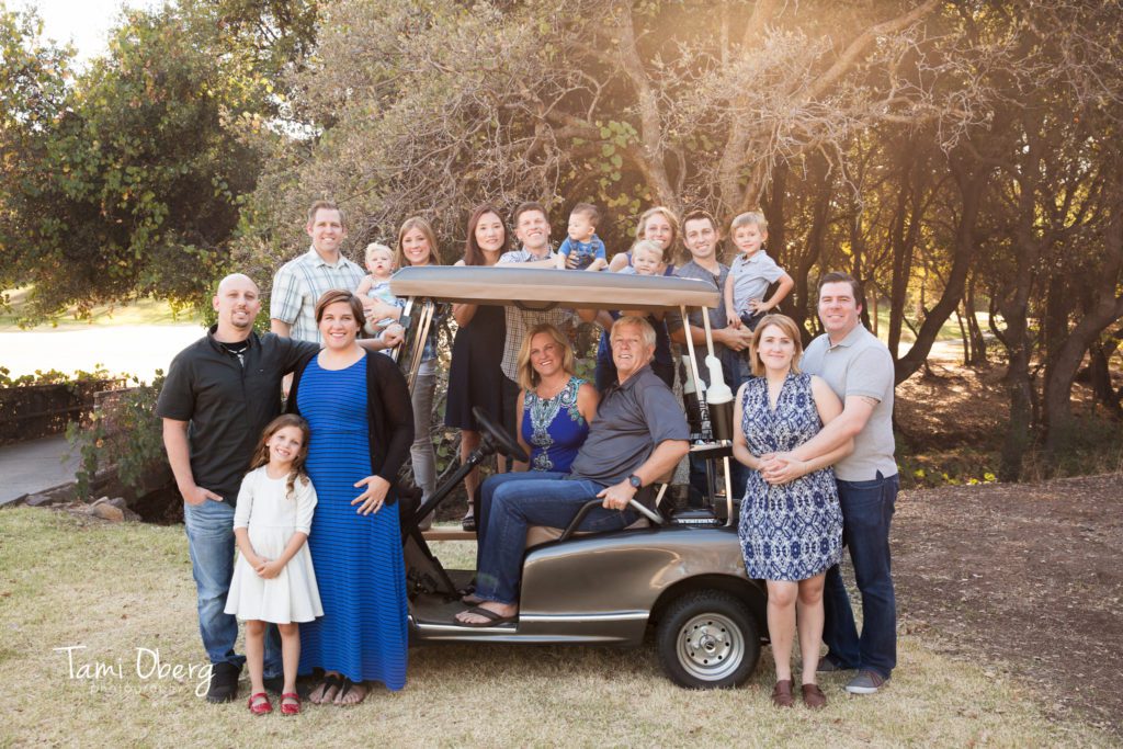 large family in a golf cart