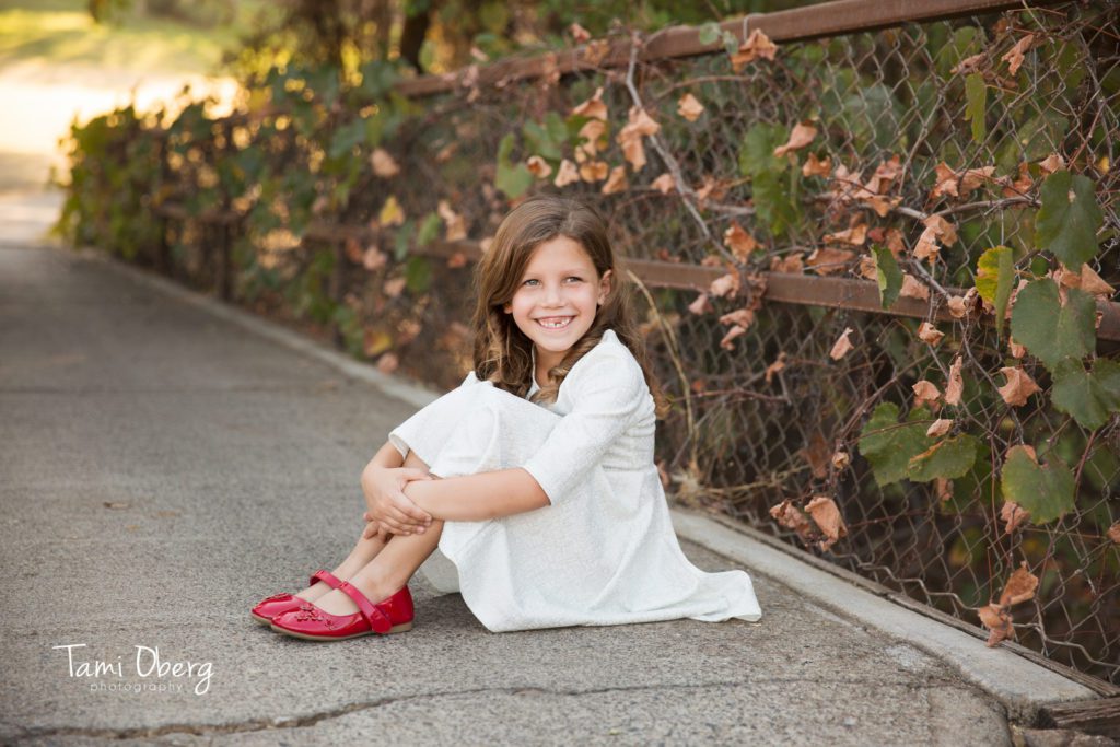 6 year old with red shoes