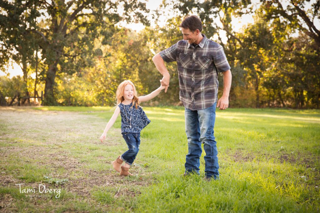 dad dancing with daughter