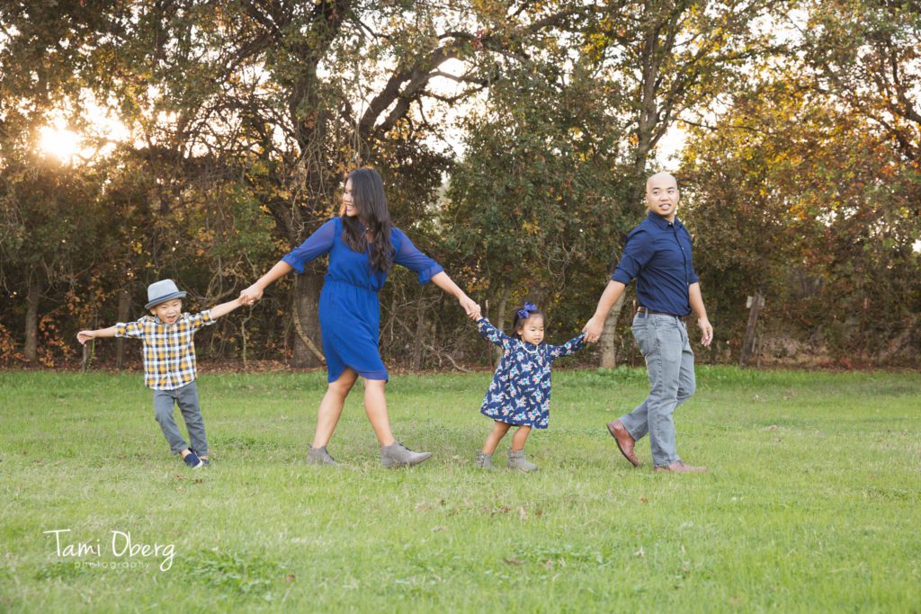 family walking in a field